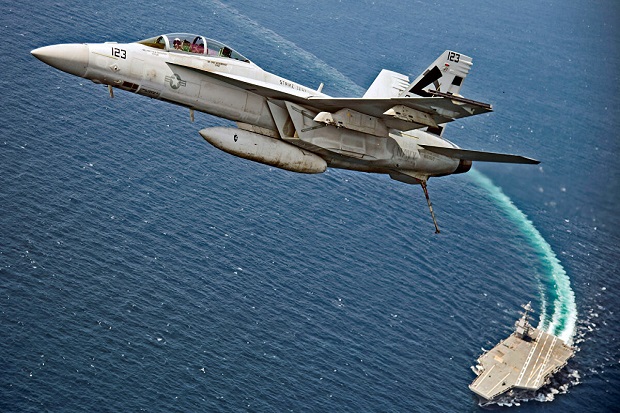 Pesawat jet tempur F-18 Super Hornet Amerika Serikat. Foto/REUTERS / US Navy/Erik Hildebrandt