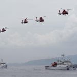 Ilustrasi kapal-kapal coast guard China. Kapal coast guard China dan kapal militer Malaysia berseteru di Laut China Selatan. Foto/REUTERS/Pichi Chuang