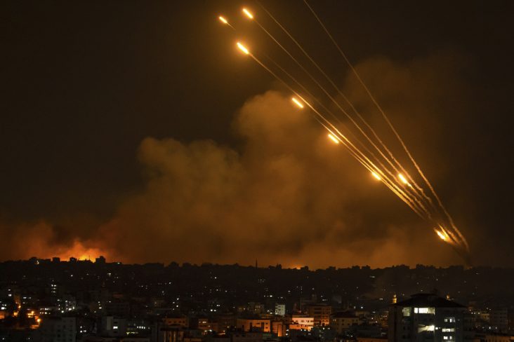 Rockets are fired toward Israel from the Gaza Strip, Sunday, Oct. 8, 2023. The militant Hamas rulers of the Gaza Strip carried out an unprecedented, multi-front attack on Israel at daybreak Saturday, firing thousands of rockets as dozens of Hamas fighters infiltrated the heavily fortified border in several locations, killing hundreds and taking captives. Palestinian health officials reported scores of deaths from Israeli airstrikes in Gaza. (AP Photo/Fatima Shbair)